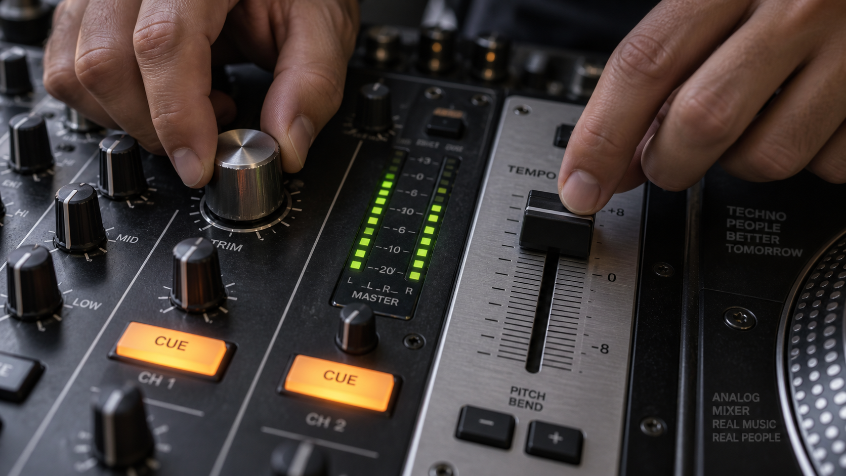 Sound engineer hands adjusting pitch fader and rotary knobs on illuminated analog DJ console